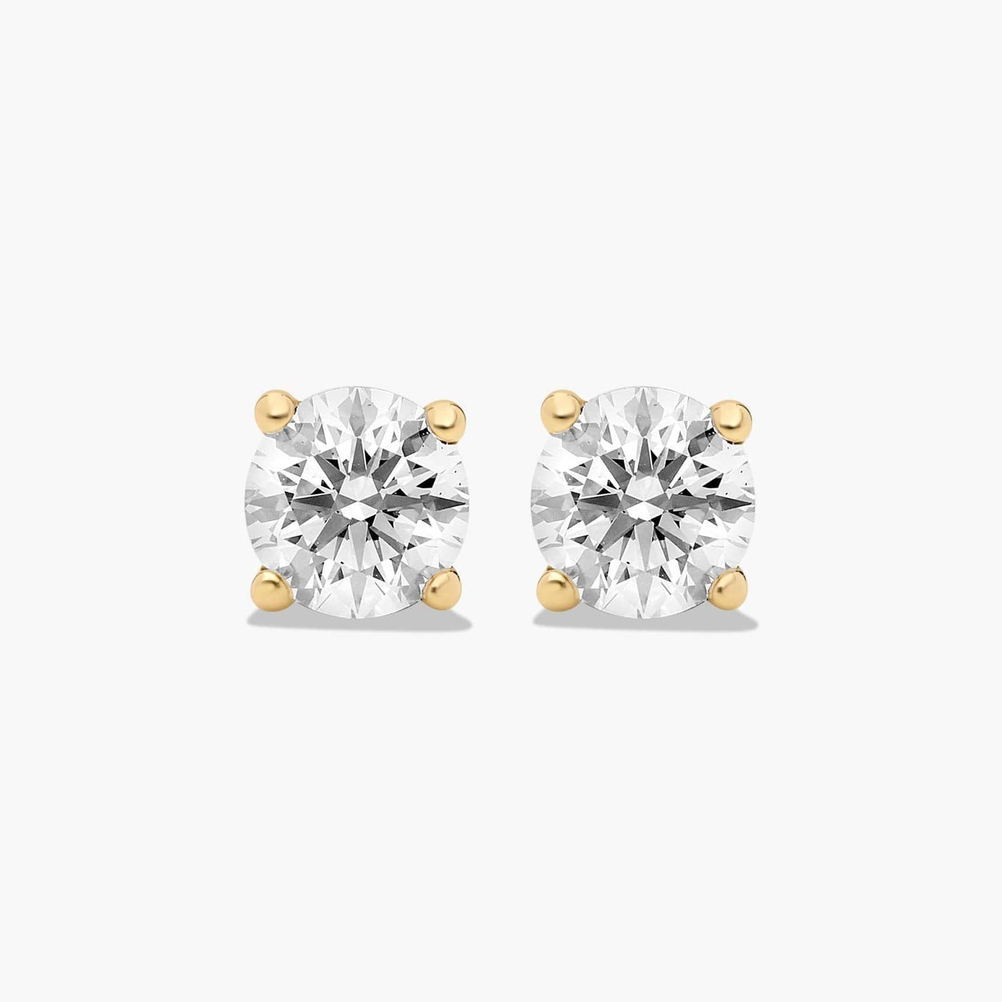 .57 CTW 14KT Yellow Gold Round Brilliant Cut Diamond Stud Earrings