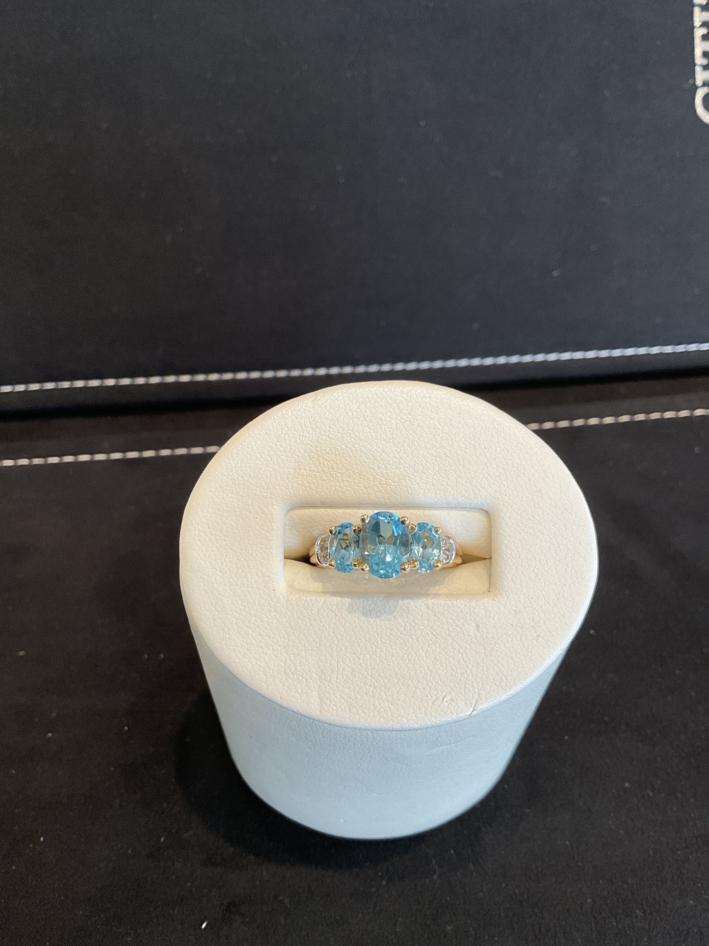 Oval Cut Tri Blue Topaz 14KT Yellow Gold Ring with 4 Round Brilliant Cut Channel Set Diamond Accents