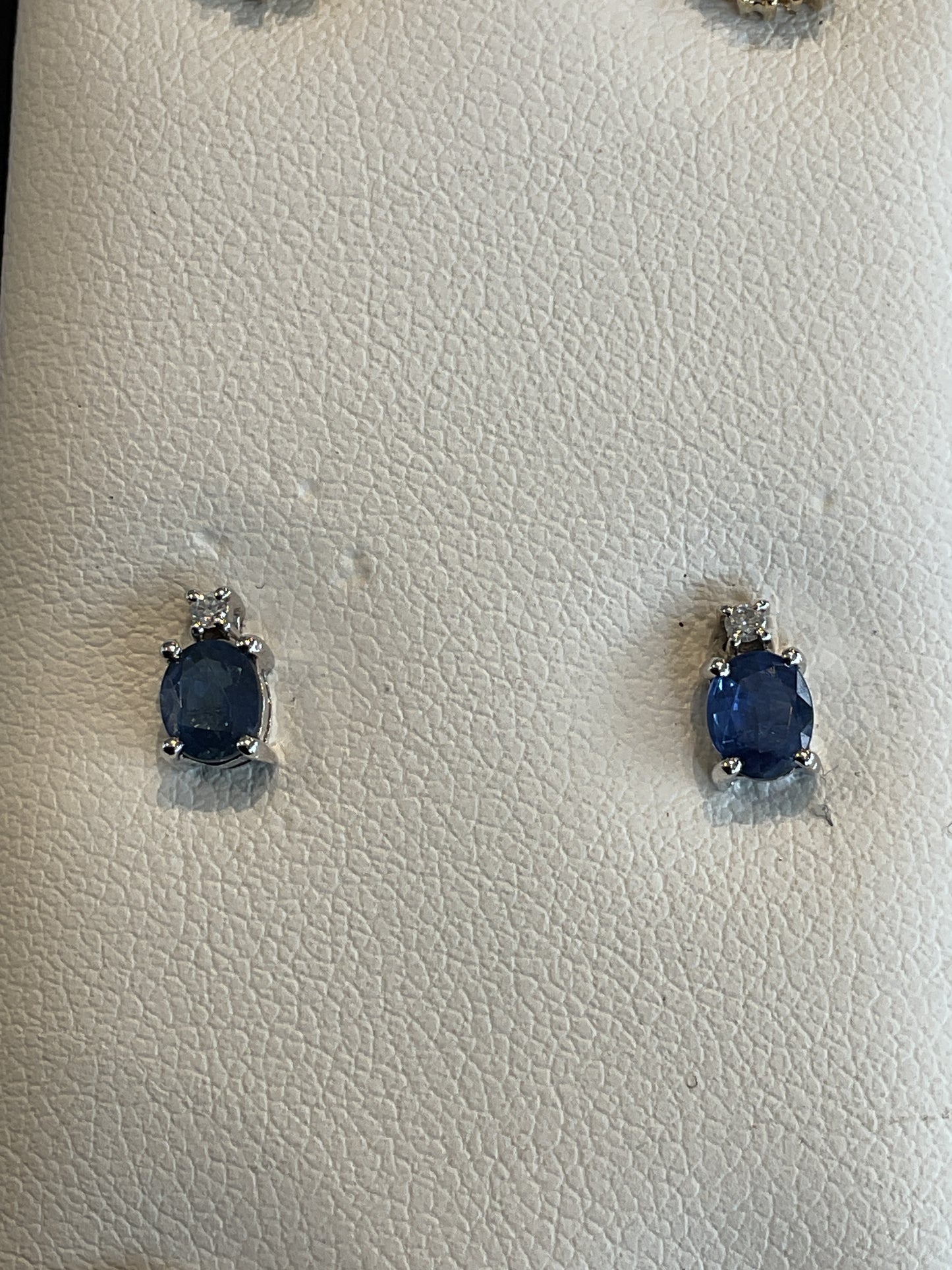 Oval Cut Blue Sapphire with Single Round Brilliant Cut Diamond Accent 14KT White Gold Stud Earrings