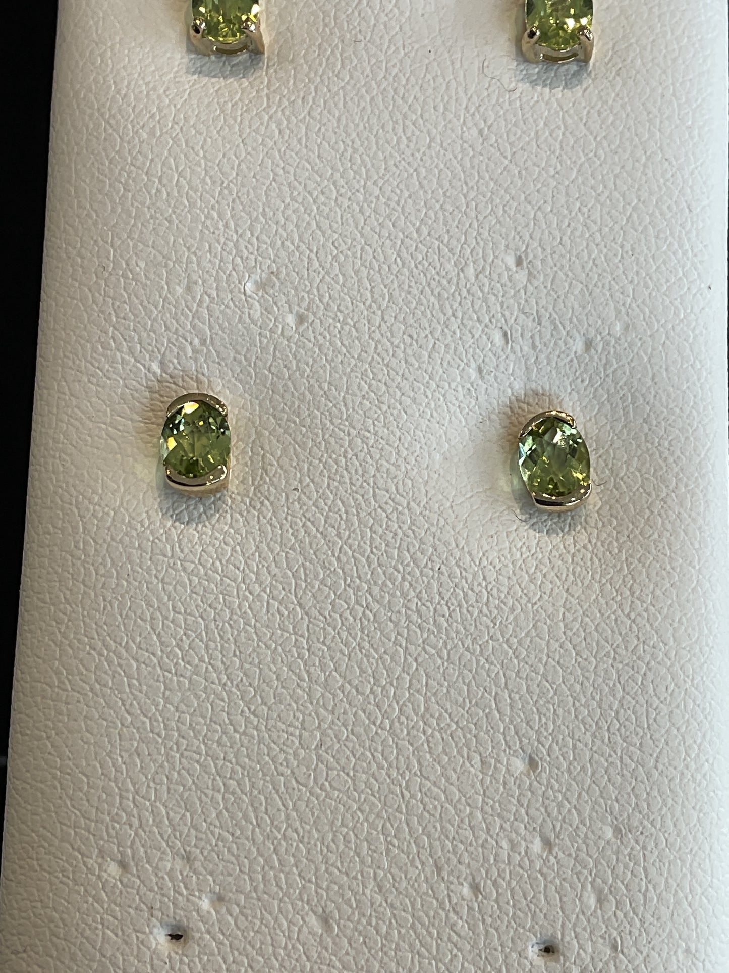 Oval Cut Peridot Half Bezel Set 14KT Yellow Gold Stud Earrings