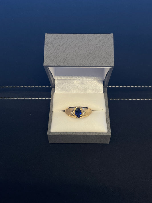 Oval Cut Blue Sapphire 10KT Yellow Gold Brushed / Polished Ring with Round Brilliant Cut Diamond Accents