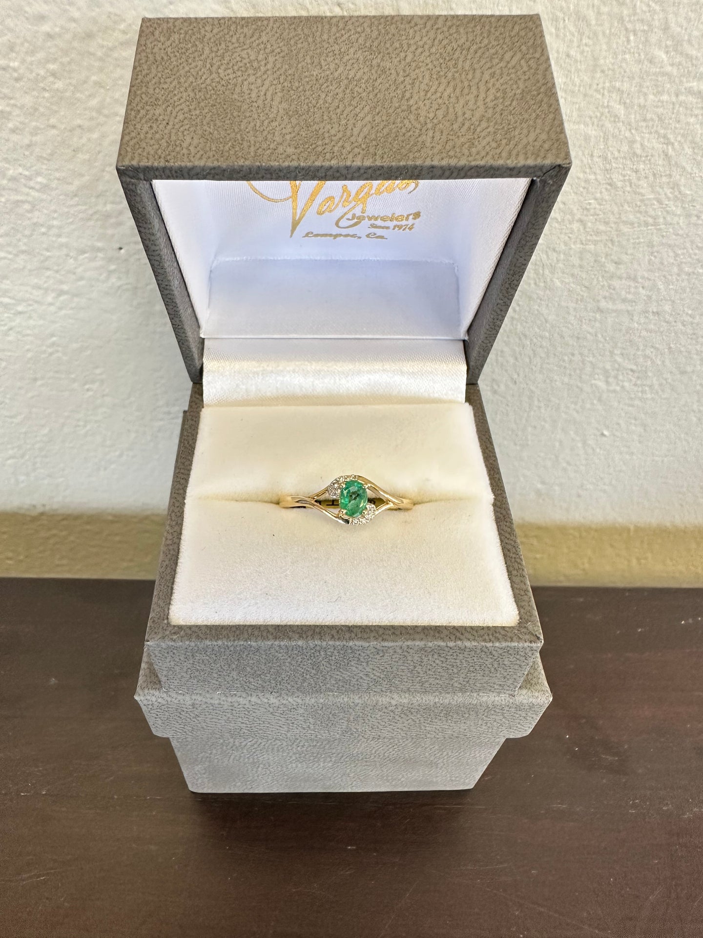 Oval Emerald and Diamond Ring