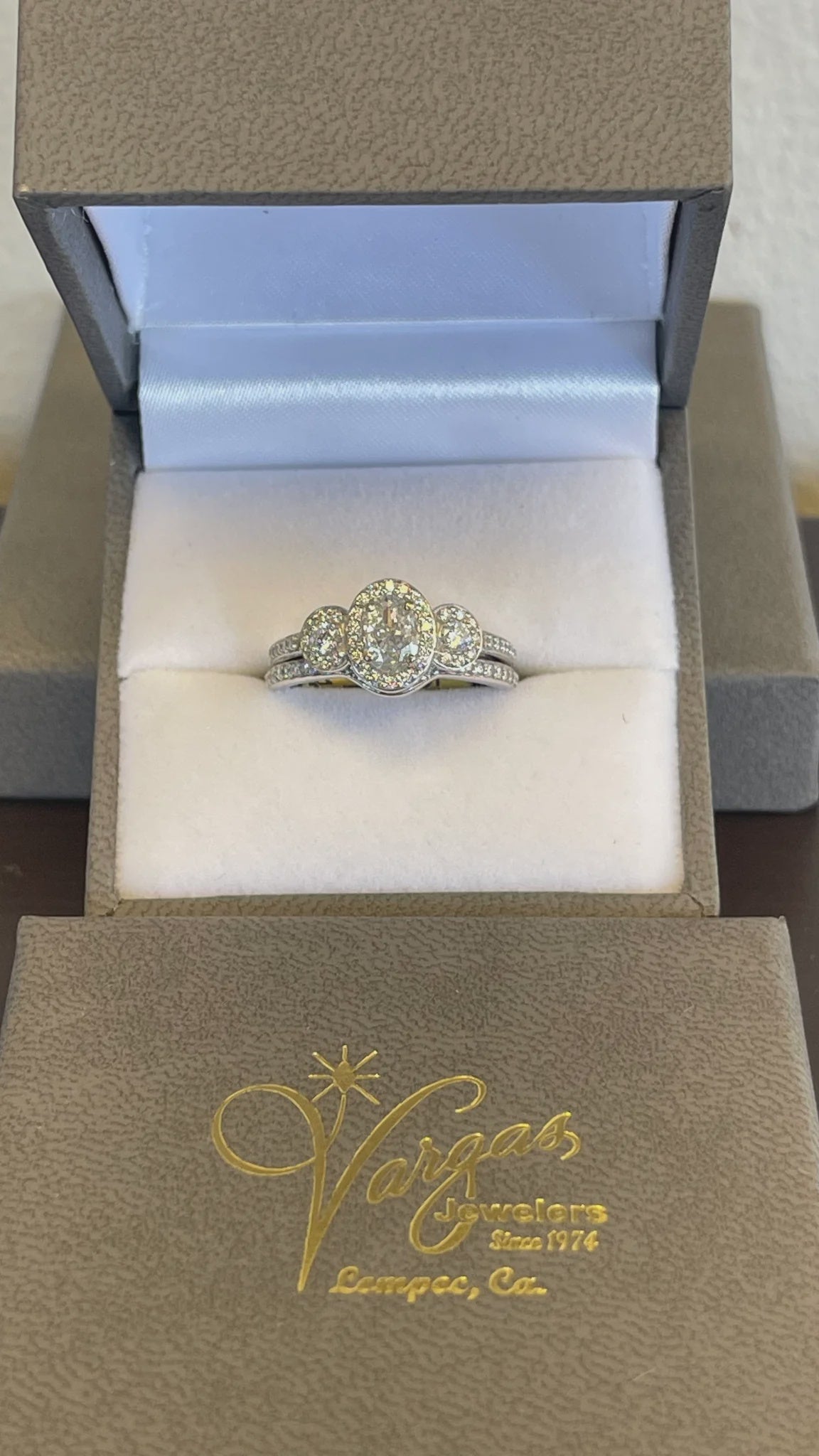 .90CTW Oval Cut and Round Cut Diamond Triple Stone 14KT White Gold Wedding Set with Round Brilliant Cut Diamond Halo and Shank