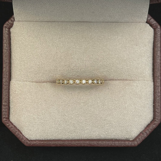0.28CTW Round Brilliant Cut Diamond Beaded Bezel Set 14KT Yellow Gold Band