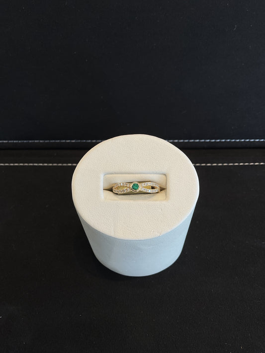 Round Cut Bezel Set Emerald 14KT Yellow Gold Infinity Ring with Round Brilliant Cut Diamonds