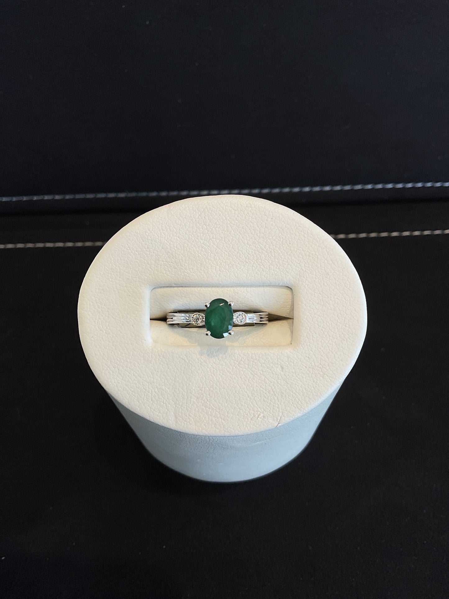 Oval Cut Emerald 14KT White Gold Ring with Round Brilliant Cut Bezel Set Diamond Accents