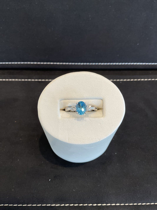 Oval Cut Blue Topaz 14KT White Gold Ring with 2 Round Brilliant Cut Diamond Accents