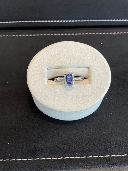Radiant Cut Tanzanite with Round Brilliant Cut Diamond Halo 14KT White Gold Ring with Round Brilliant Cut Diamond Shank