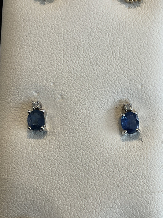 Oval Cut Blue Sapphire with Single Round Brilliant Cut Diamond Accent 14KT White Gold Stud Earrings