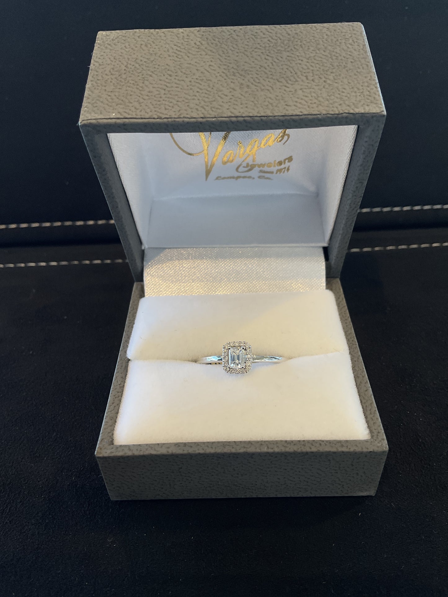 0.21CTW Emerald Cut Diamond 14KT White Gold Engagement Ring with Round Brilliant Cut Diamond Halo