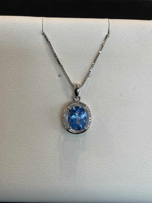 Oval Cut Glacier Blue Topaz with Polished and Round Brilliant Cut Diamond Accent Halo 14KT White Gold Necklace 18" 10KT White Gold Chain