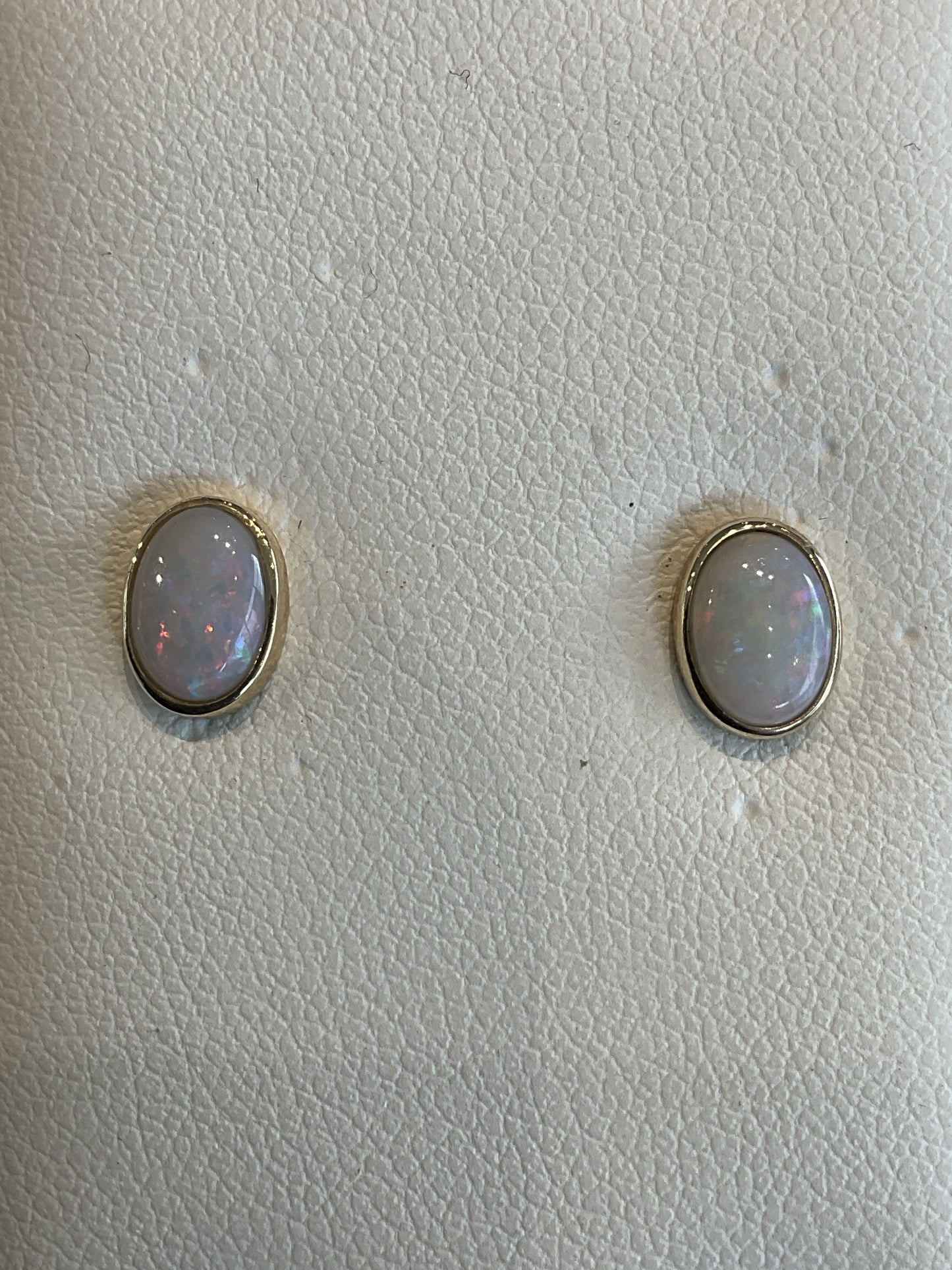 Oval Cut Bezel Set Opal 14KT Yellow Gold Stud Earrings