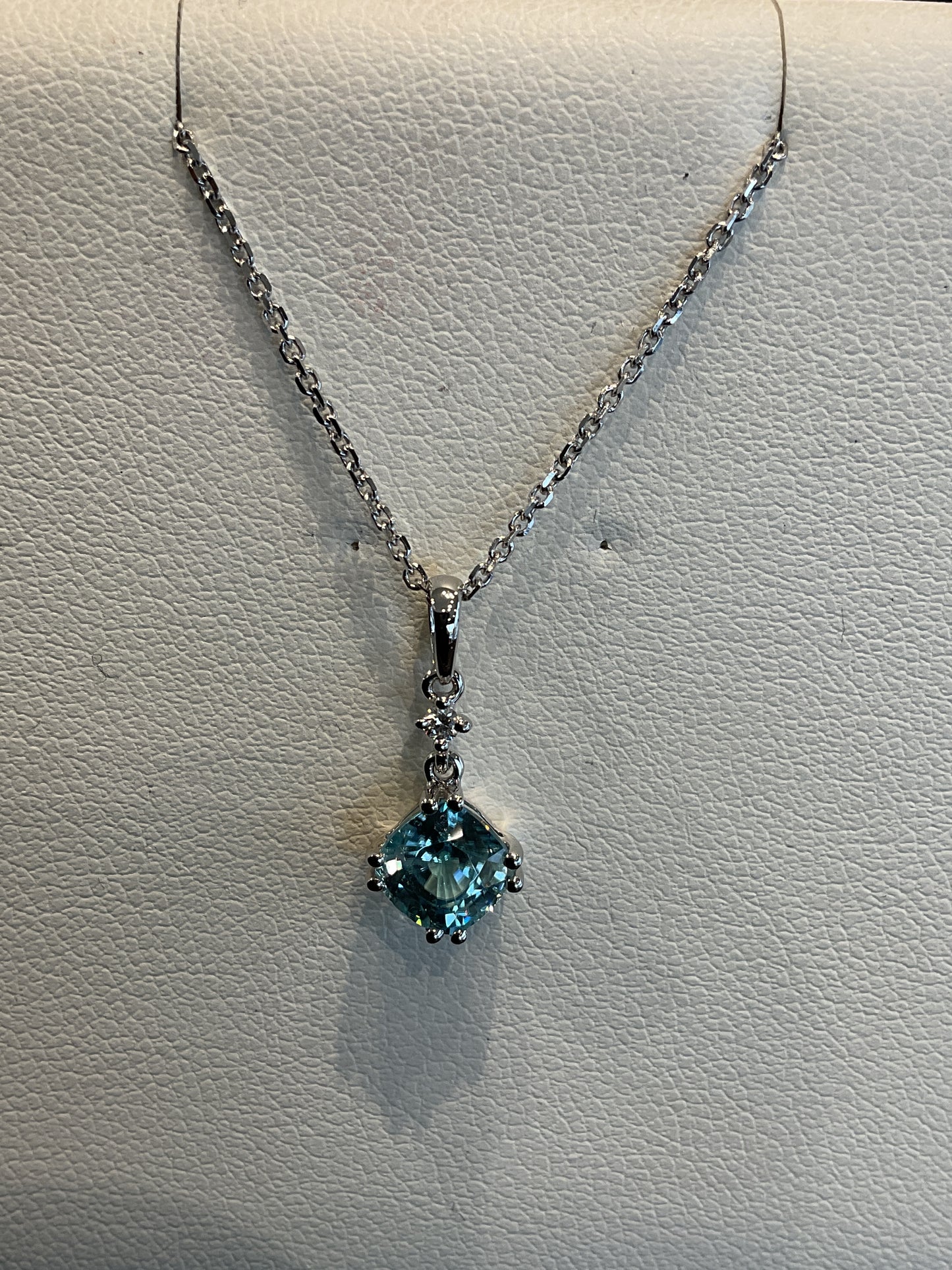 Cushion Cut Blue Zircon with Single Round Brilliant Cut Diamond Accent 14KT White Gold Necklace 18" 14KT White Gold Chain