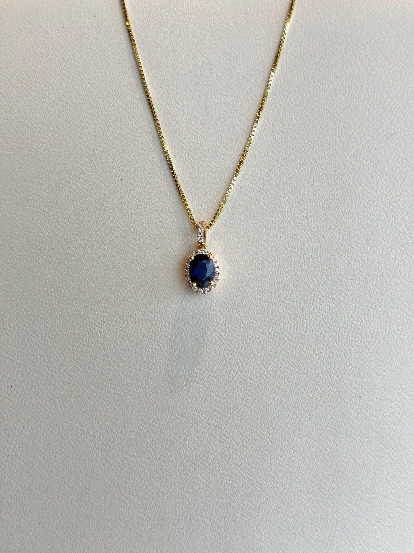 Oval Blue Sapphire With Diamond Border Pendant